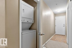 Stackable laundry appliances within a dedicated closet - 