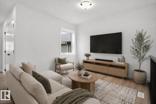 49 Elliott Wynd, Fort Saskatchewan, AB - Indoor Photo Showing Living Room