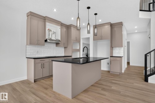 49 Elliott Wynd, Fort Saskatchewan, AB - Indoor Photo Showing Kitchen With Upgraded Kitchen