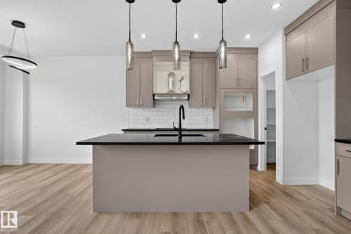 49 Elliott Wynd, Fort Saskatchewan, AB - Indoor Photo Showing Kitchen With Upgraded Kitchen