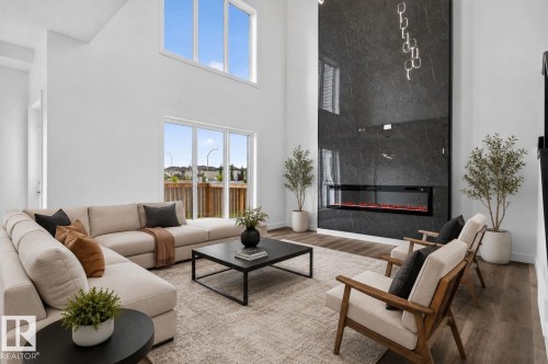 45 Elliott Wynd, Fort Saskatchewan, AB - Indoor Photo Showing Living Room With Fireplace
