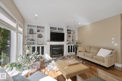 18 Embassy Place, St. Albert, AB - Indoor Photo Showing Living Room With Fireplace