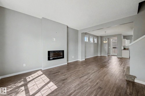118 Southfork Road, Leduc, AB - Indoor Photo Showing Living Room With Fireplace