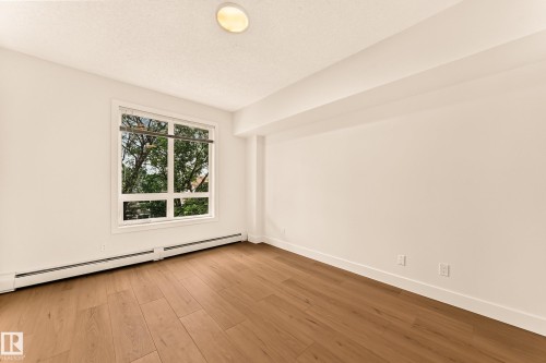 #323 6315 135 Av Nw, Edmonton, AB - Indoor Photo Showing Other Room