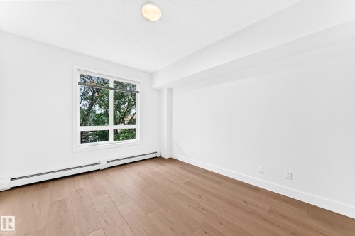 #323 6315 135 Av Nw, Edmonton, AB - Indoor Photo Showing Other Room