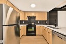 #323 6315 135 Av Nw, Edmonton, AB  - Indoor Photo Showing Kitchen With Double Sink 