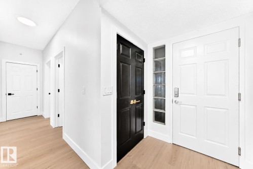 #323 6315 135 Av Nw, Edmonton, AB - Indoor Photo Showing Other Room