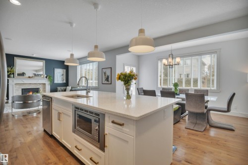 4231 Savaryn Drive Sw, Edmonton, AB - Indoor Photo Showing Kitchen With Double Sink With Upgraded Kitchen