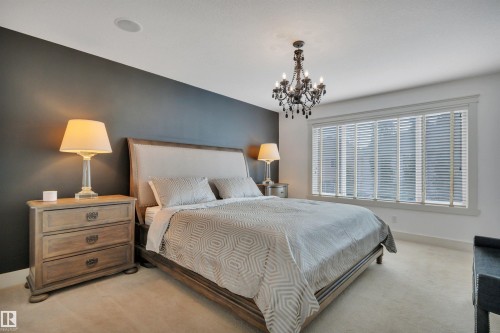 4231 Savaryn Drive Sw, Edmonton, AB - Indoor Photo Showing Bedroom