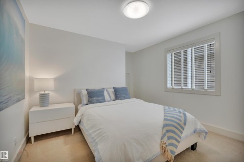 4231 Savaryn Drive Sw, Edmonton, AB - Indoor Photo Showing Bedroom