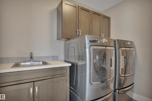 4231 Savaryn Drive Sw, Edmonton, AB - Indoor Photo Showing Laundry Room