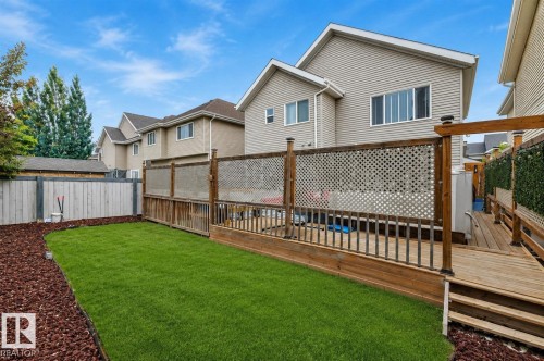 AI Enhanced - 4231 Savaryn Drive Sw, Edmonton, AB - Outdoor With Deck Patio Veranda With Exterior