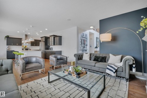 4231 Savaryn Drive Sw, Edmonton, AB - Indoor Photo Showing Living Room