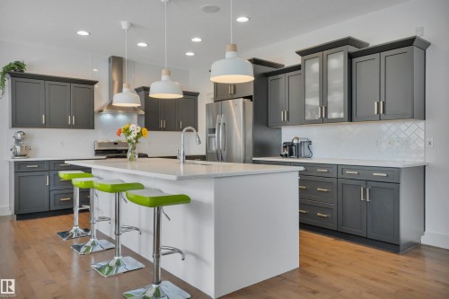 4231 Savaryn Drive Sw, Edmonton, AB - Indoor Photo Showing Kitchen With Upgraded Kitchen
