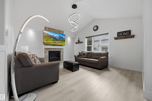 1 Dittrich Avenue, Fort Saskatchewan, AB - Indoor Photo Showing Living Room With Fireplace