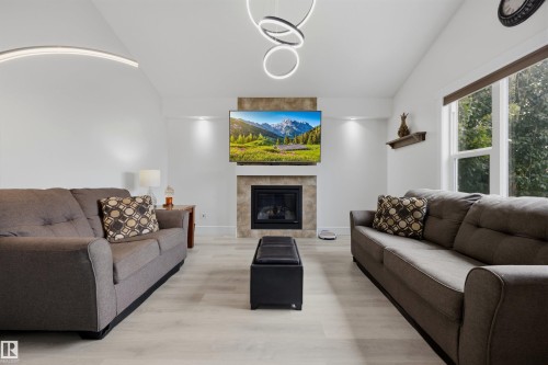 1 Dittrich Avenue, Fort Saskatchewan, AB - Indoor Photo Showing Living Room With Fireplace