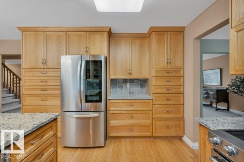 Oak cabinets with plenty of storage space - 5620 151 Street Nw, Edmonton, AB - Indoor Photo Showing Kitchen