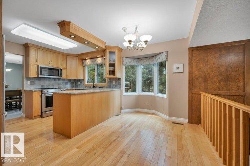 Family size breakfast nook overlooking the beautiful back yard - 5620 151 Street Nw, Edmonton, AB - Indoor Photo Showing Kitchen