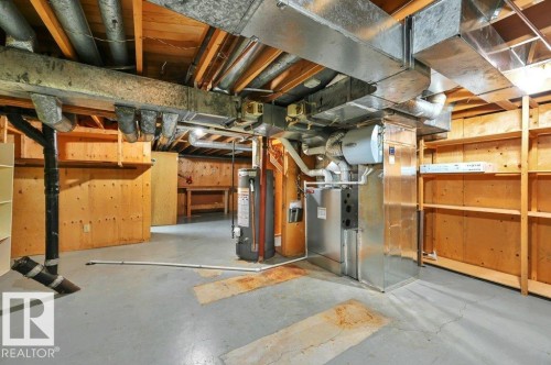 With high efficiency furnace - 5620 151 Street Nw, Edmonton, AB - Indoor Photo Showing Basement
