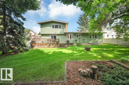 Expansive west backyard with huge trees - 5620 151 Street Nw, Edmonton, AB - Outdoor With Deck Patio Veranda