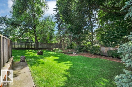 Beautiful mature landscaping - 5620 151 Street Nw, Edmonton, AB - Outdoor With Backyard