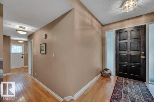 Hardwood flooring - 5620 151 Street Nw, Edmonton, AB - Indoor Photo Showing Other Room