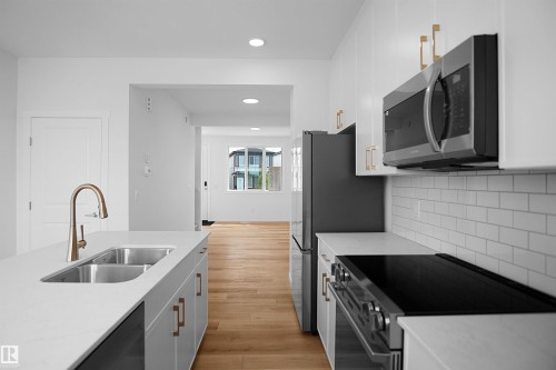 4296 Kinglet Drive Nw, Edmonton, AB - Indoor Photo Showing Kitchen With Double Sink With Upgraded Kitchen