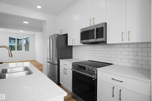 4296 Kinglet Drive Nw, Edmonton, AB - Indoor Photo Showing Kitchen With Double Sink With Upgraded Kitchen