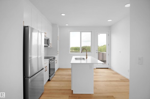 4296 Kinglet Drive Nw, Edmonton, AB - Indoor Photo Showing Kitchen With Double Sink With Upgraded Kitchen
