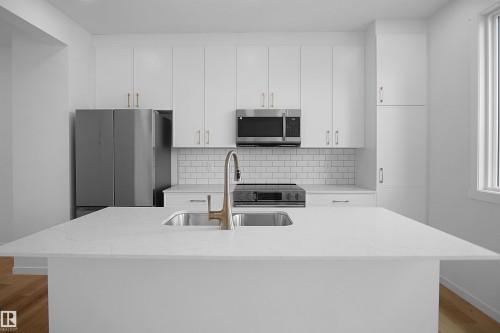 4296 Kinglet Drive Nw, Edmonton, AB - Indoor Photo Showing Kitchen With Upgraded Kitchen
