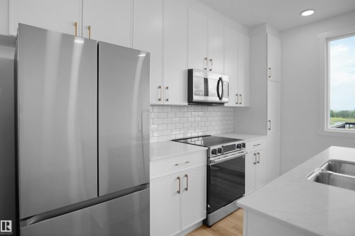 4296 Kinglet Drive Nw, Edmonton, AB - Indoor Photo Showing Kitchen With Double Sink With Upgraded Kitchen