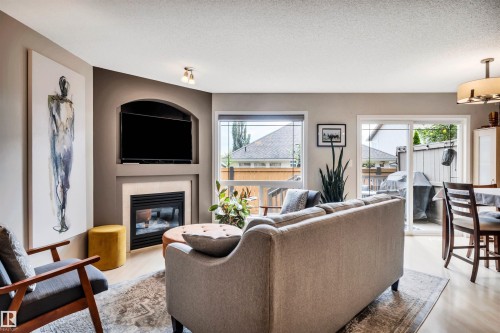 #12 20 Norman Ct, St. Albert, AB - Indoor Photo Showing Living Room With Fireplace