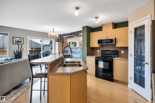 #12 20 Norman Ct, St. Albert, AB - Indoor Photo Showing Kitchen With Double Sink