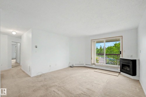 #452 10520 120 Nw, Edmonton, AB - Indoor With Fireplace
