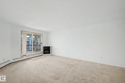 #452 10520 120 Nw, Edmonton, AB - Indoor Photo Showing Other Room