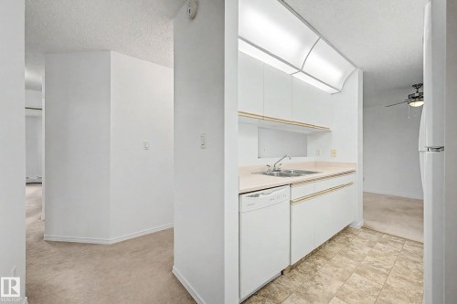 #452 10520 120 Nw, Edmonton, AB - Indoor Photo Showing Kitchen With Double Sink