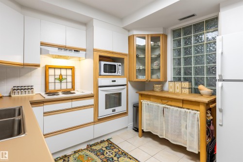 #205 9131 99 St Nw, Edmonton, AB - Indoor Photo Showing Kitchen With Double Sink