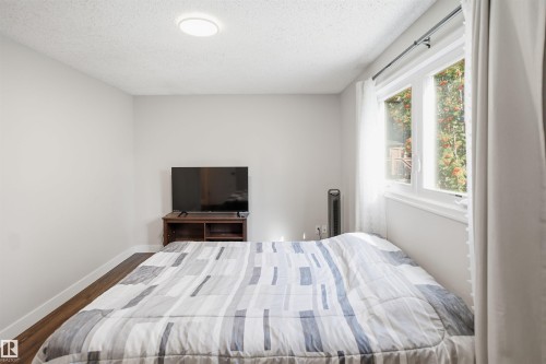 Recessed ceiling light fixture - 3515 20 Ave Nw, Edmonton, AB - Indoor Photo Showing Bedroom