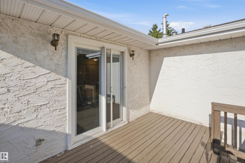 Exterior wood-finish deck with stucco siding - 3515 20 Ave Nw, Edmonton, AB - Outdoor With Deck Patio Veranda With Exterior