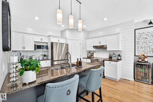 823 77 Street Sw, Edmonton, AB - Indoor Photo Showing Kitchen With Stainless Steel Kitchen With Double Sink With Upgraded Kitchen