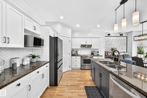 823 77 Street Sw, Edmonton, AB - Indoor Photo Showing Kitchen With Stainless Steel Kitchen With Double Sink With Upgraded Kitchen