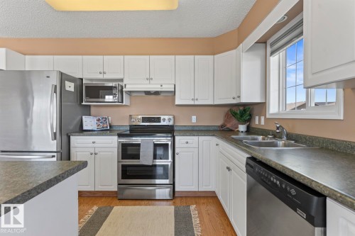 #201 1705 7 Av, Cold Lake, AB - Indoor Photo Showing Kitchen With Stainless Steel Kitchen With Double Sink