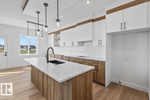 29 Foxtail Road, Fort Saskatchewan, AB - Indoor Photo Showing Kitchen With Double Sink With Upgraded Kitchen