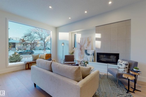 10515 75 Street Nw, Edmonton, AB - Indoor Photo Showing Living Room With Fireplace