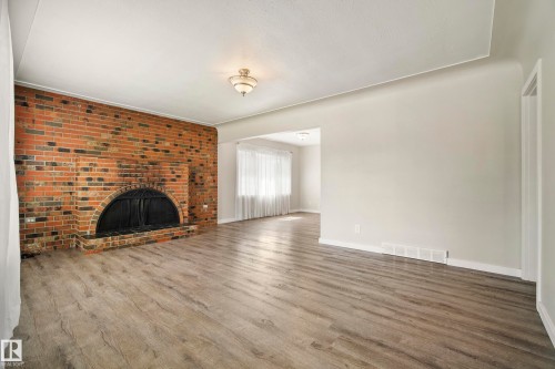 10426 79 Street Nw, Edmonton, AB - Indoor Photo Showing Living Room With Fireplace