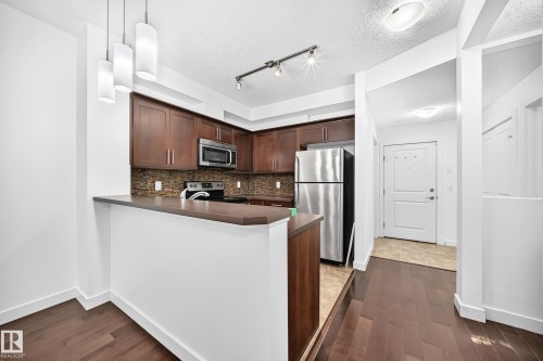 #102 2584 Anderson Way Sw, Edmonton, AB - Indoor Photo Showing Kitchen With Upgraded Kitchen