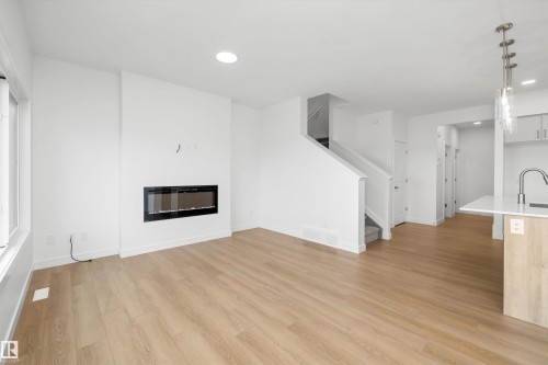 8632 183 Avenue Nw, Edmonton, AB - Indoor Photo Showing Living Room With Fireplace