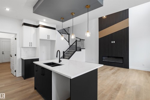 20 Munn Way, Leduc, AB - Indoor Photo Showing Kitchen With Double Sink With Upgraded Kitchen