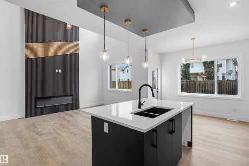 20 Munn Way, Leduc, AB - Indoor Photo Showing Kitchen With Double Sink With Upgraded Kitchen