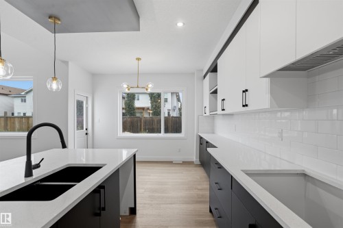 20 Munn Way, Leduc, AB - Indoor Photo Showing Kitchen With Double Sink With Upgraded Kitchen